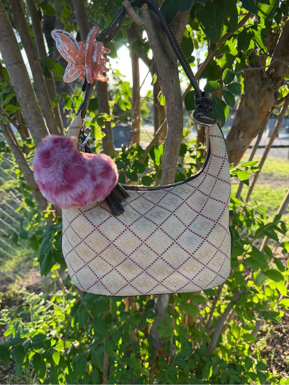 Dooney & Bourke Cream Diamond-Pattern Shoulder Bag with Pink Heart Charm